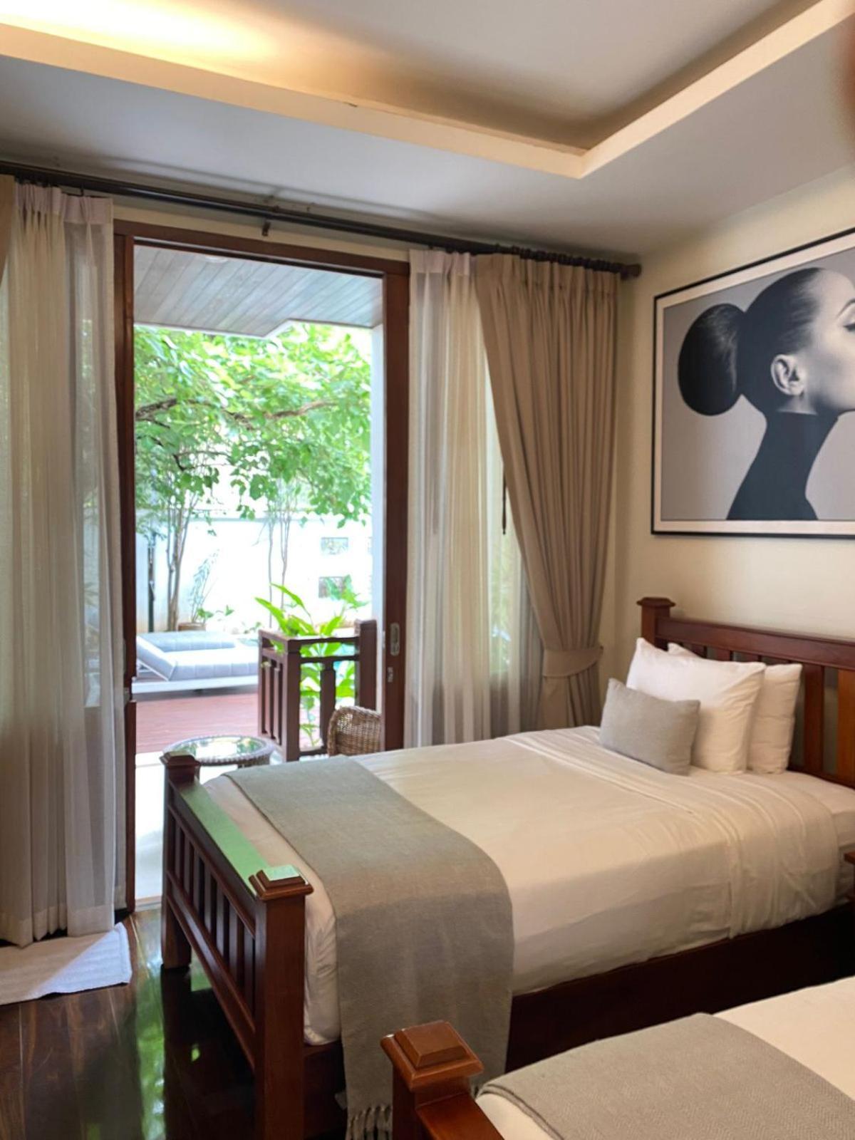 Athena Hotel Pakse Exterior photo